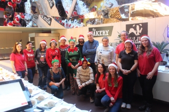 Wildlife Trust staff getting ready to serve volunteer Christmas lunch
