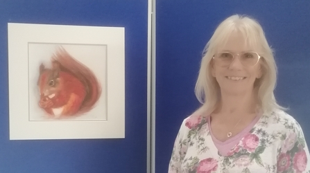 Artist, Ann Fearon, and her winning entry for the 'wildlife on nature reserves' category 