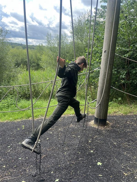 Lewis swinging on ropes at Brockholes park