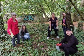 North Manchester volunteers planting wildflowers in their local park