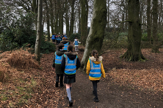 School children walking at Mere Sands Wood 