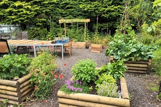 The outdoor space continues to flourish with the addition of new beds and further clearance work