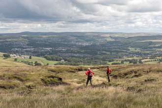 View of Holcombe Moor with two people