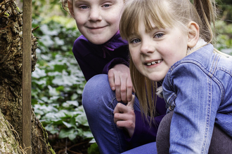 Two children in a woodland