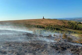 Smoking moorland beneath Darwen Tower