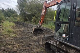 Diggers at work at Barlow's Farm
