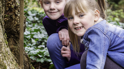 Two children in a woodland