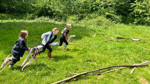 Children playing with hobby unicorns