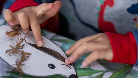 Crafting a hedgehog with leaves