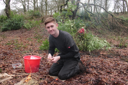 Young Myplace participant making a fire