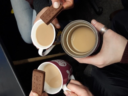 enjoying a brew and biscuit