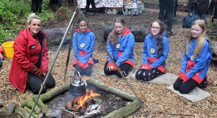 Around the fire, LWT's Katie Dearden with Alicia, Katelyn, Daisy and Kiera of Lostock Hall 