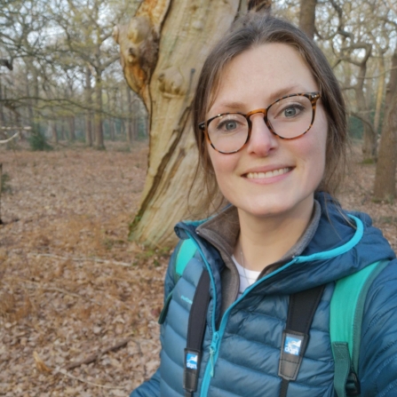 Naturalist and nature blogger, Lucy Hodson, walking in woodland