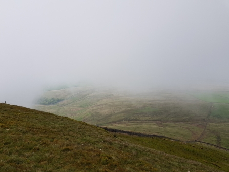 Foggy view from the top of Pendle Hill in Barley