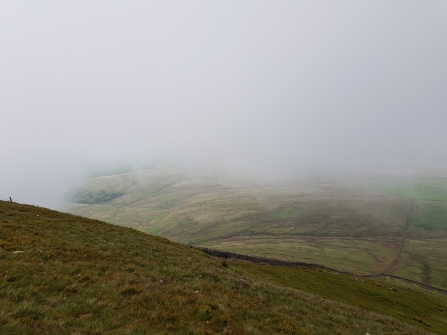 Foggy view from the top of Pendle Hill in Barley