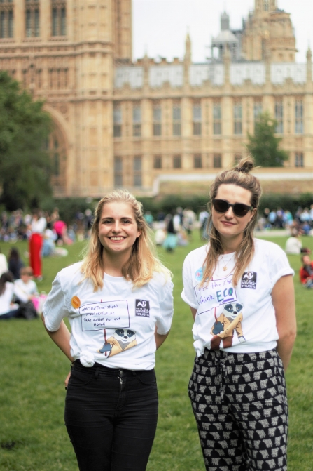 Ellie and Jenny of Lancashire Wildlife Trust standing in front of Parliament during the mass lobby