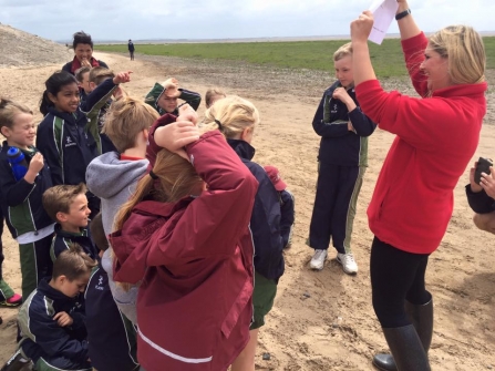 Fylde Sand Dunes Project Officer, Amy Pennington, teaching a Beach School class