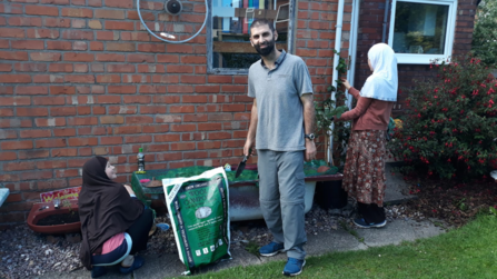 Ghazanfar Akram and family with their growing kit