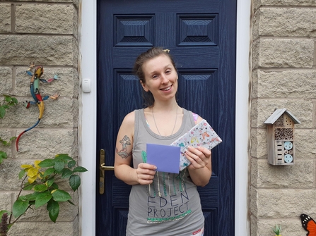 Volunteer, Joy Stephanie Love, with their prize after winning newcomer of the year at the 2022 Supporters Day