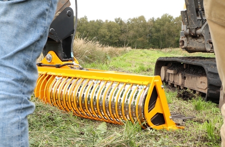 A yellow digger bucket