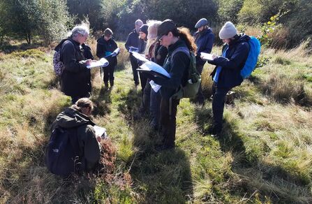 John and Ben surveying for new discoveries