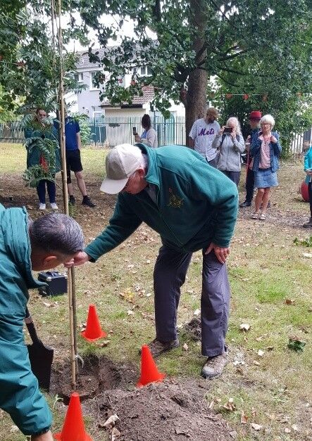 Planting a tree to commemorate lost members over the years