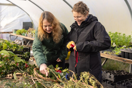 From left: SAM ALFORD (Head of Nature Connections, Eden Project) and EMMA CARTER (Nature Connections participant) engaging in Nature Connections activity