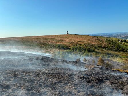 Smoking moorland beneath Darwen Tower