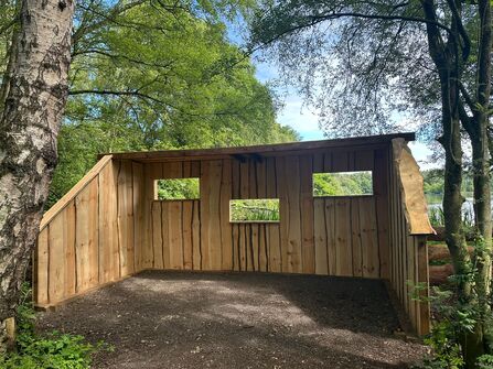 Wooden viewing screen at Mere Sands Wood
