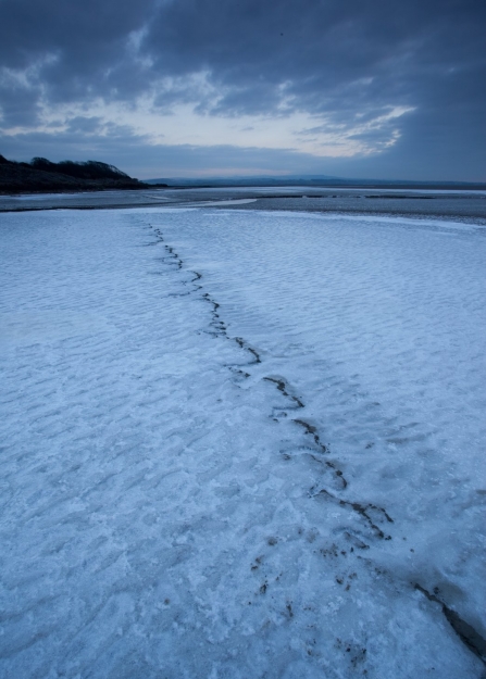 Ice on the mudflats at Morecambe Bay