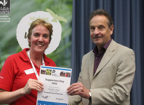 Catherine Haddon accepting the young person of the year award on behalf of Cornelius Jones at the Supporters Day 2022